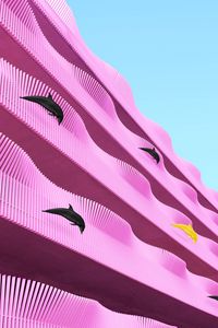 Preview wallpaper building, facade, dolphins, pink, wavy, architecture