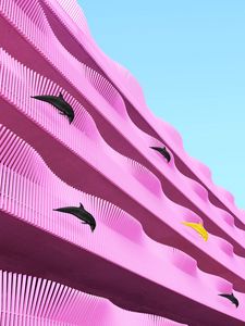 Preview wallpaper building, facade, dolphins, pink, wavy, architecture