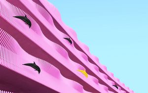 Preview wallpaper building, facade, dolphins, pink, wavy, architecture