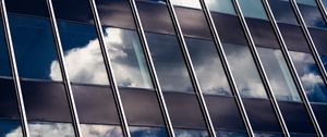 Preview wallpaper building, facade, glass, reflection, clouds