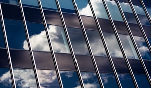 Preview wallpaper building, facade, glass, reflection, clouds