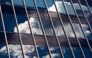 Preview wallpaper building, facade, glass, reflection, clouds