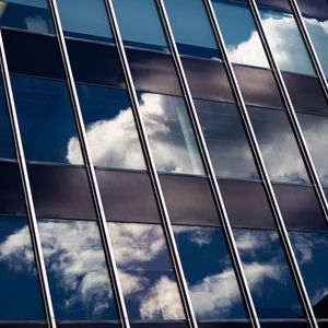 Preview wallpaper building, facade, glass, reflection, clouds