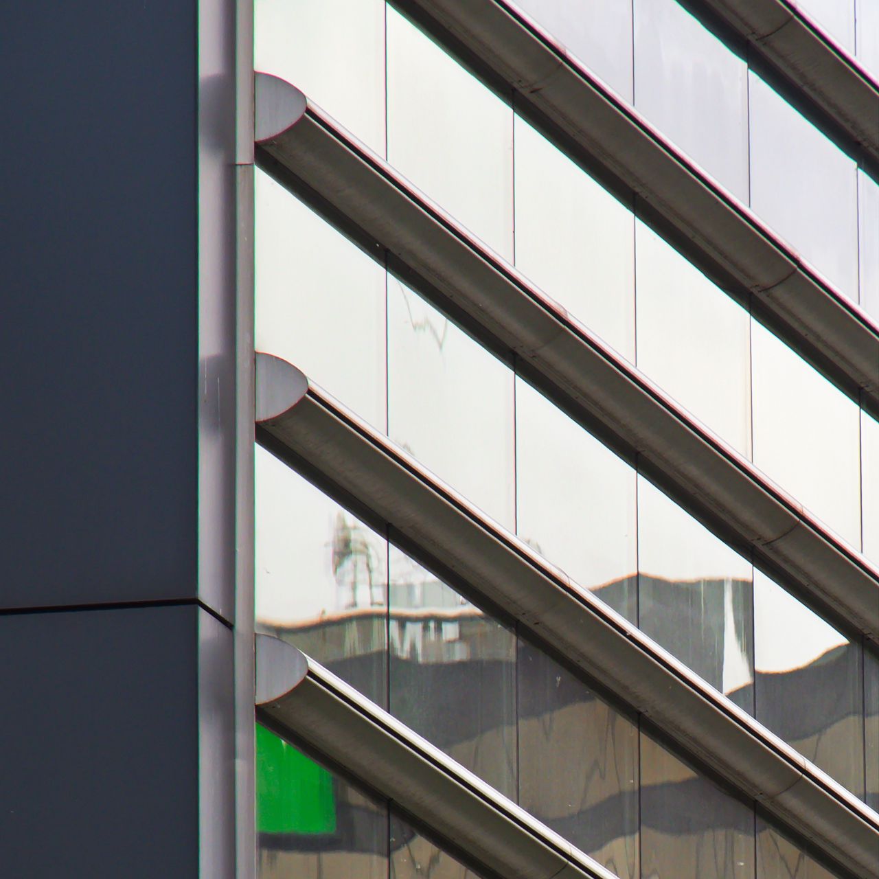 Download wallpaper 1280x1280 building, facade, glass, stripes ipad