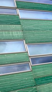 Preview wallpaper building, facade, panels, windows, green