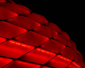 Preview wallpaper building, facade, red, backlight, mesh, architecture