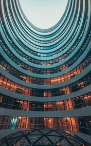 Preview wallpaper building, facade, round, glassy, sky