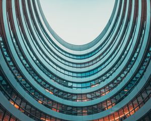 Preview wallpaper building, facade, round, glassy, sky