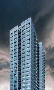 Preview wallpaper building, facade, skyscraper, clouds, cloudy