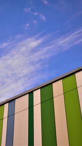 Preview wallpaper building, facade, stripes, clouds