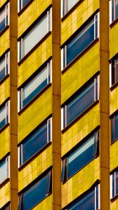 Preview wallpaper building, facade, windows, architecture, yellow