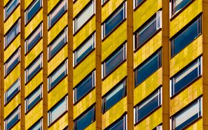 Preview wallpaper building, facade, windows, architecture, yellow