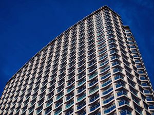 Preview wallpaper building, facade, windows, sky, blue