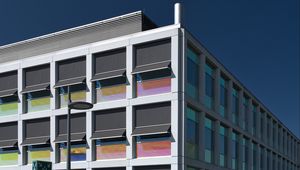 Preview wallpaper building, facade, windows, faces, shadows