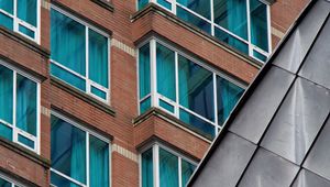 Preview wallpaper building, facade, windows, bricks, architecture