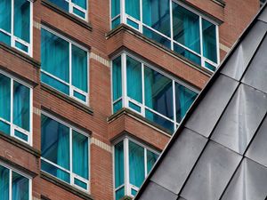 Preview wallpaper building, facade, windows, bricks, architecture