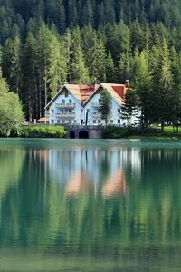 Preview wallpaper building, forest, lake, reflection