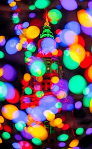 Preview wallpaper building, glare, colorful, lights, bokeh