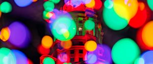 Preview wallpaper building, glare, colorful, lights, bokeh