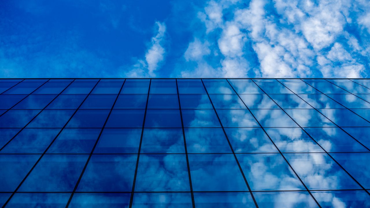 Wallpaper building, glass, clouds, reflection hd, picture, image