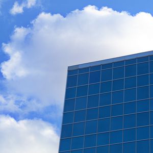 Preview wallpaper building, glass, facade, clouds, sky
