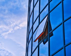 Preview wallpaper building, glass, mirror, window, sky, clouds, blue