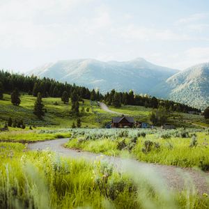 Preview wallpaper building, hill, path, grass, trees, forests