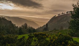 Preview wallpaper building, hills, fog, nature