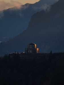 Preview wallpaper building, hills, mountains, dark
