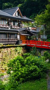 Preview wallpaper building, house, roofs, bridge, architecture