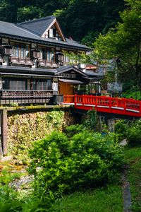 Preview wallpaper building, house, roofs, bridge, architecture