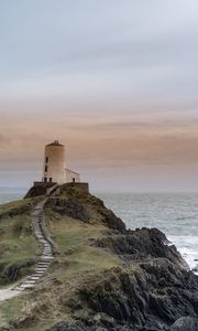 Preview wallpaper building, lighthouse, rock, stairs, sea