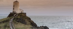 Preview wallpaper building, lighthouse, rock, stairs, sea