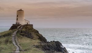 Preview wallpaper building, lighthouse, rock, stairs, sea