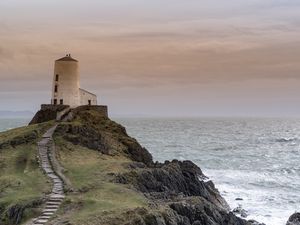 Preview wallpaper building, lighthouse, rock, stairs, sea