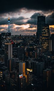 Preview wallpaper building, lights, city, twilight, clouds