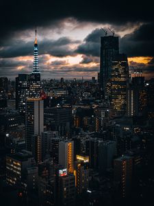 Preview wallpaper building, lights, city, twilight, clouds