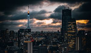 Preview wallpaper building, lights, city, twilight, clouds