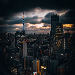 Preview wallpaper building, lights, city, twilight, clouds