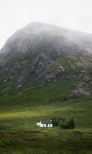 Preview wallpaper building, mountain, valley, nature, greenery