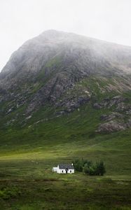 Preview wallpaper building, mountain, valley, nature, greenery