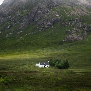 Preview wallpaper building, mountain, valley, nature, greenery