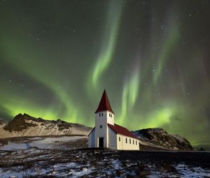 Preview wallpaper building, mountains, northern lights, night