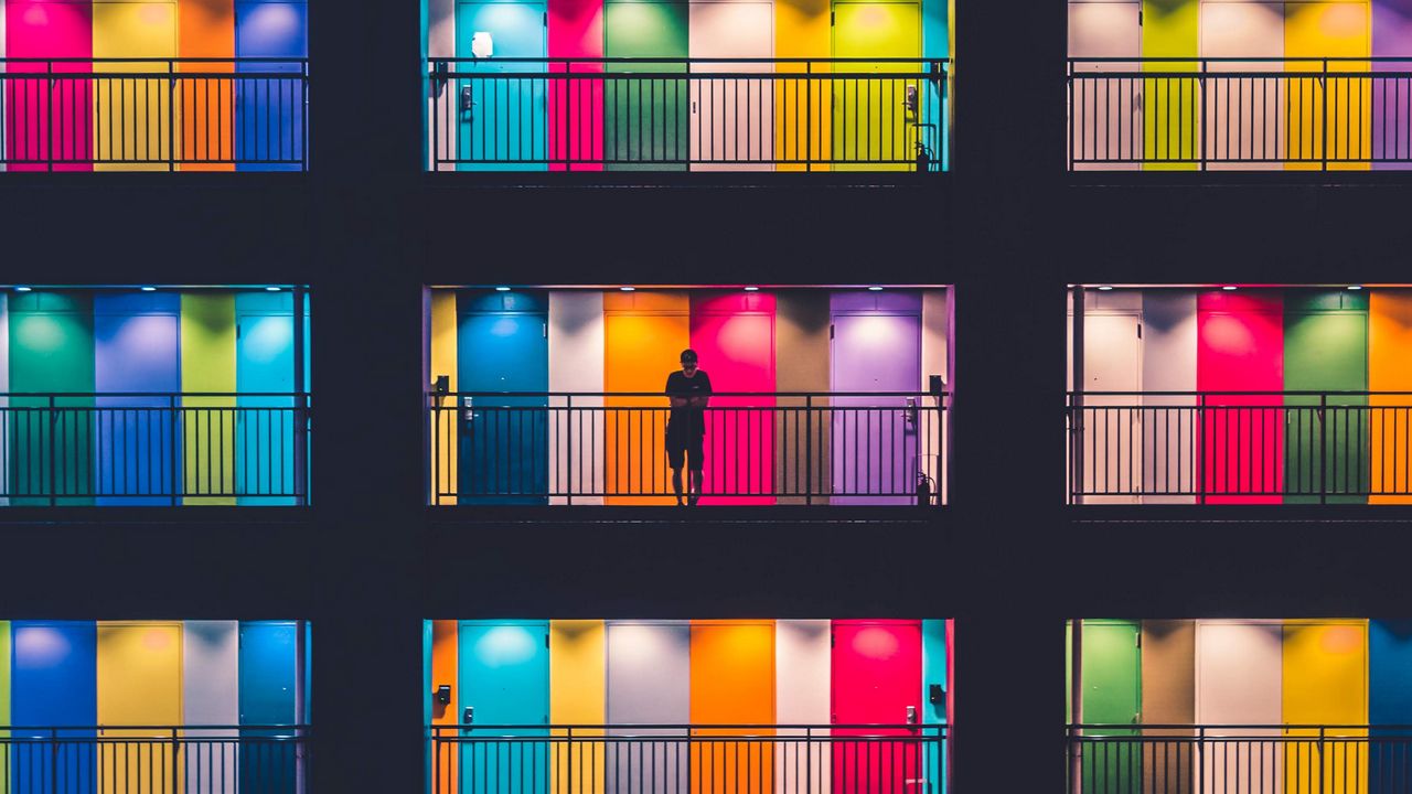 Wallpaper building, multicolored, doors, balconies, silhouette