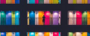 Preview wallpaper building, multicolored, doors, balconies, silhouette