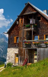 Preview wallpaper building, nature, mountains, sky