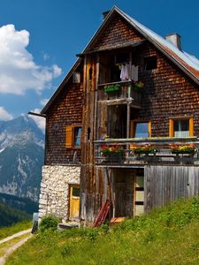 Preview wallpaper building, nature, mountains, sky