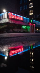 Preview wallpaper building, neon, sign, puddle, reflection