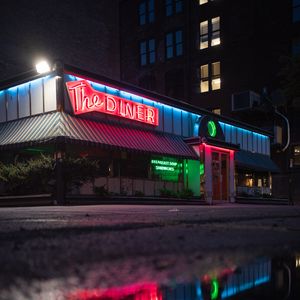 Preview wallpaper building, neon, sign, puddle, reflection