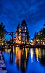 Preview wallpaper building, night city, bridge, reflection, lights